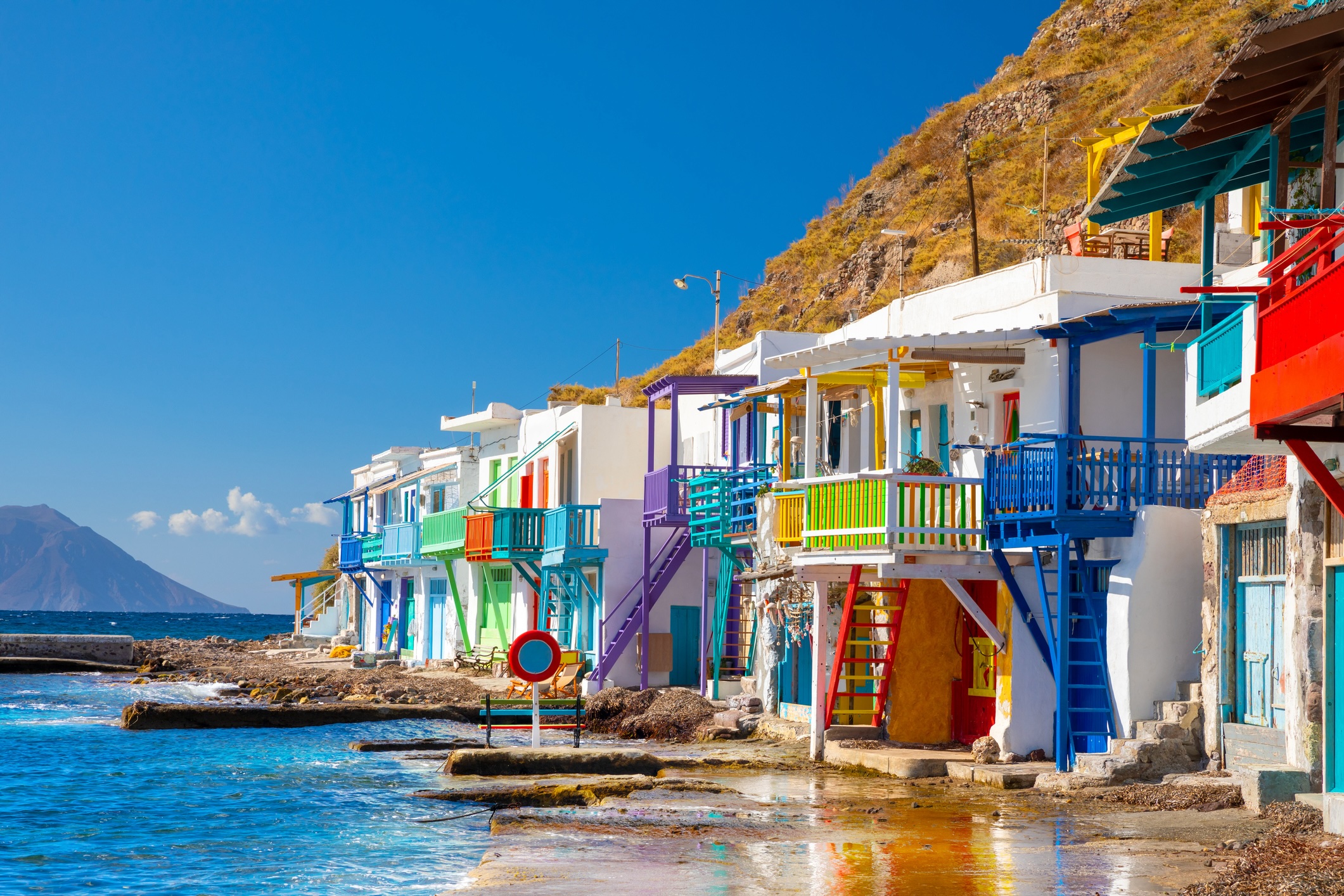 Vibrant fishing village of Klima with white houses and colorful doors on Milos Island in Greece