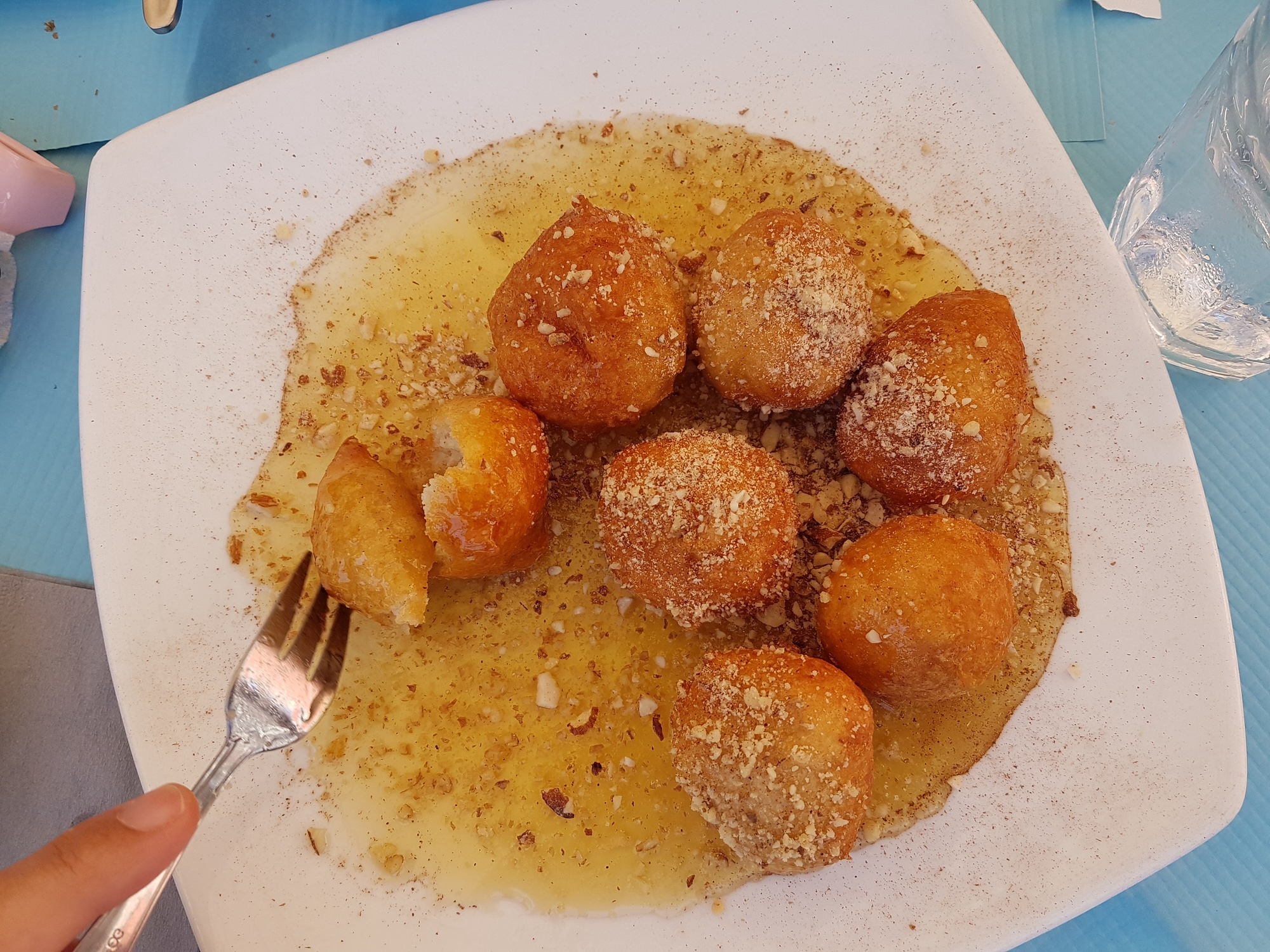 loukoumades donuts with honey and nuts greek traditional food sweet