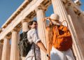 Tourist in front of the Parthenon temple