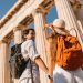 Tourist in front of the Parthenon temple