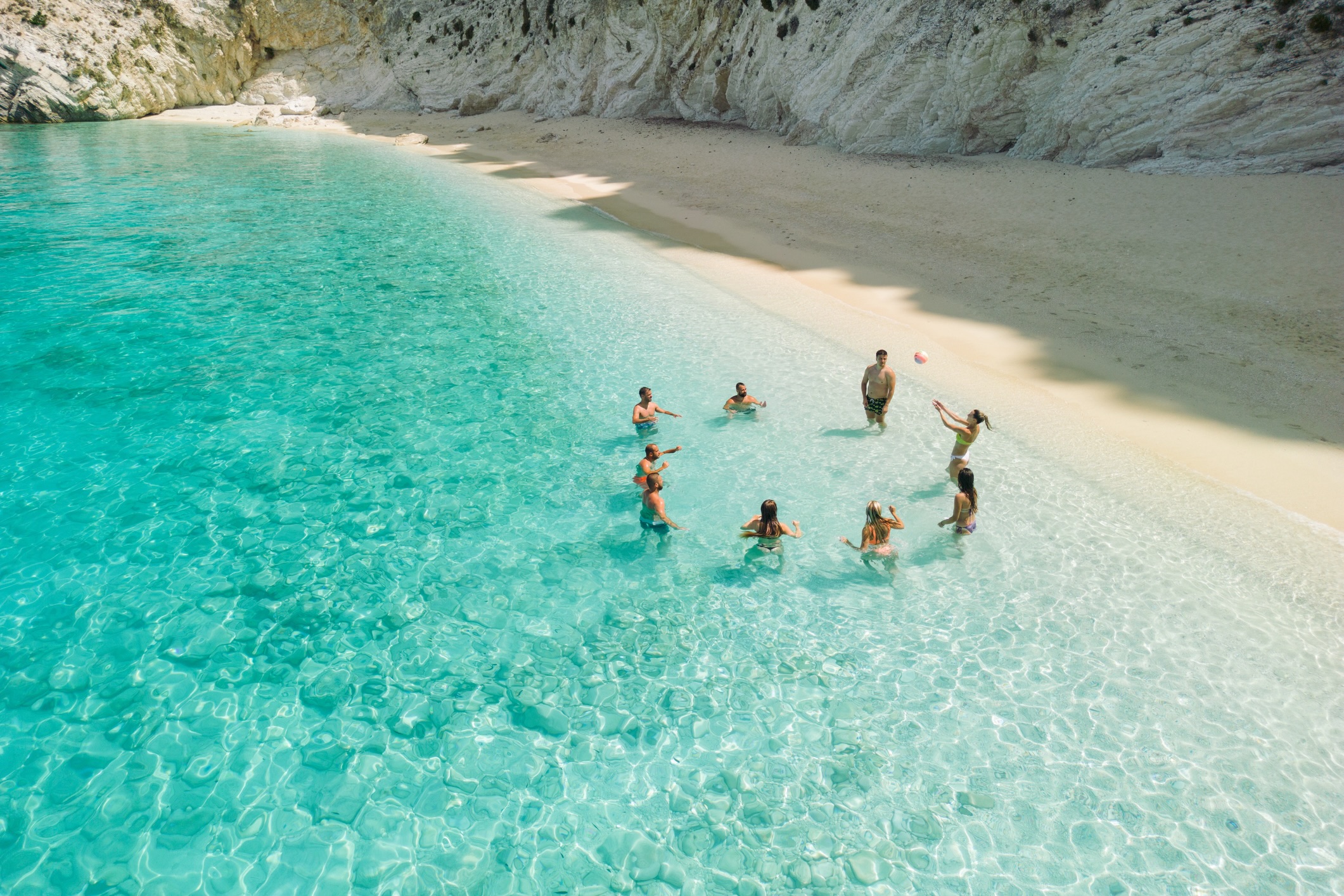 Group of people enjoying beautiful beaches and coast of Ionian island