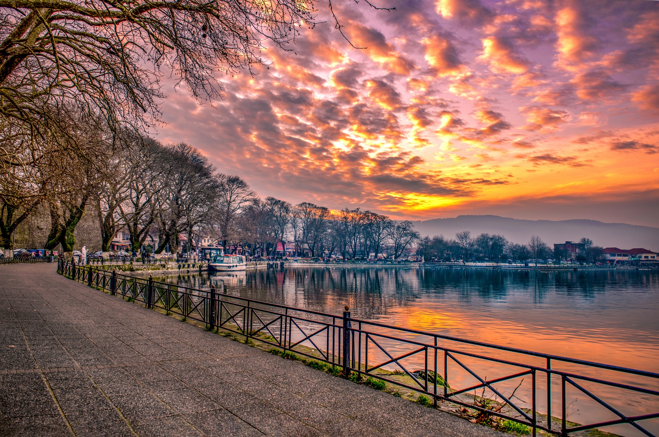 View to the lake Pamvotis at sunset. Ioannina city, Greece.