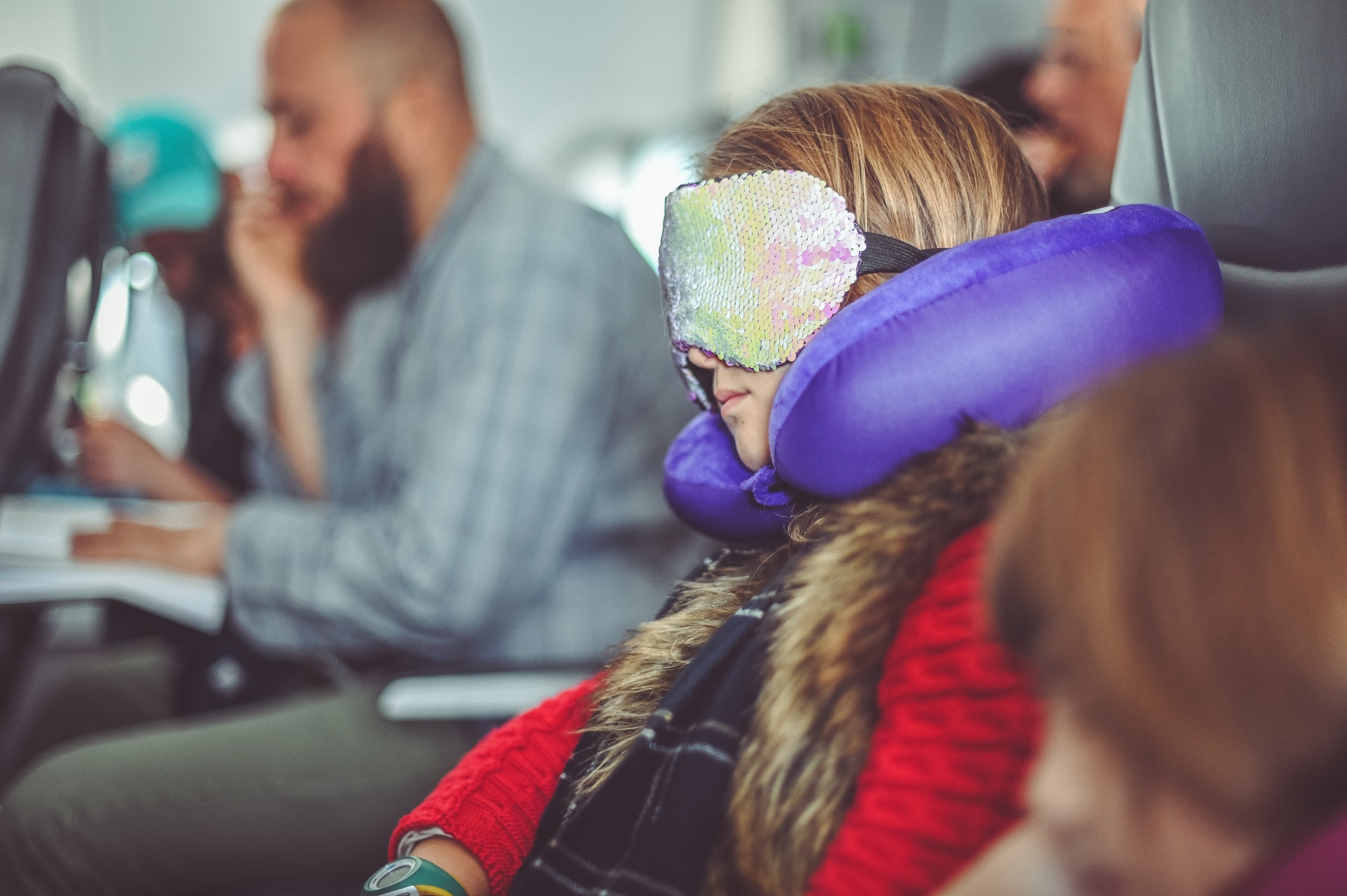 Girl falls asleep on an airplane