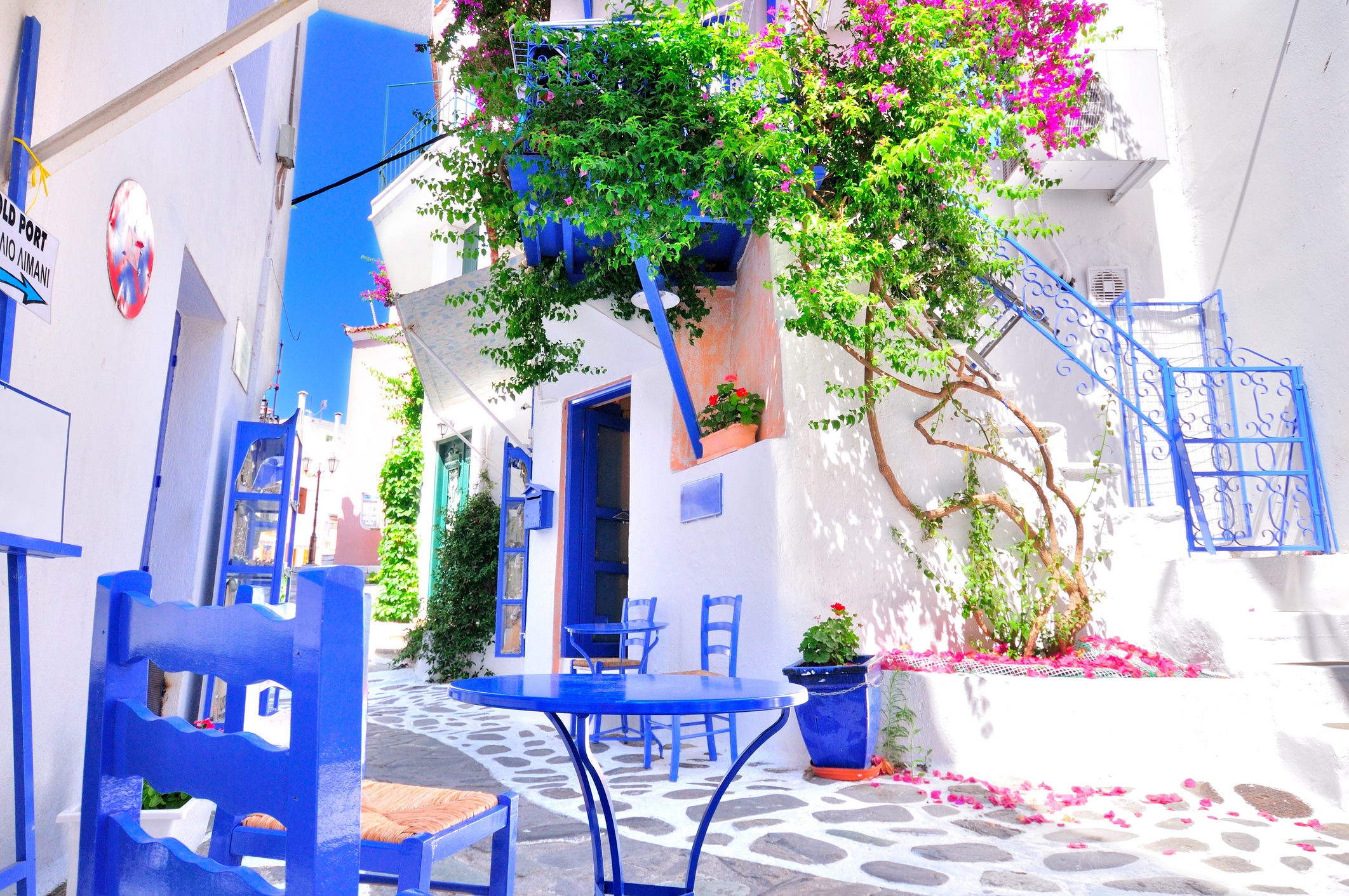 Narrow whitewashed street of Skiathos, Greece
