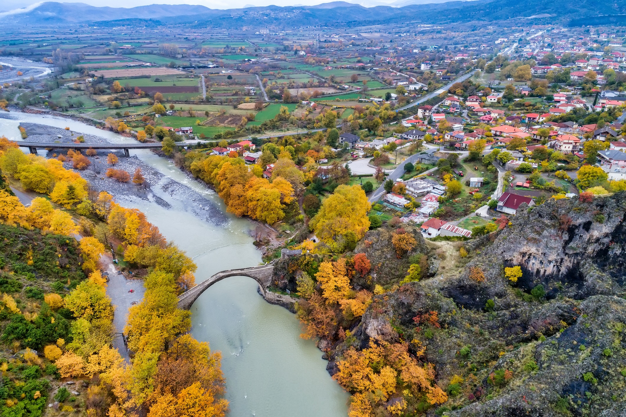 Aerial view of Konitsa old bridge and Aoos River